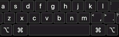 Un primer plano de un teclado accesible en pantalla, centrado, en las tres filas inferiores.  La tecla Espacio se resalta con un borde rojo parpadeante cuando se presiona.