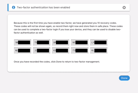A page in the Two-factor authentication set up process appears, with a notification at the top reading 'Two-factor authentification has been enabled'. Two rows displaying a total of 10 recovery codes that have been censored appear underneath text explaining to the user that because this is the first time they have enabled two-factor authentication, these recovery codes need to be saved by the user as a fail safe or back up for their account.